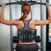 Ceinture_lombaire_portee_par_une_femme_pendant_une_s_ance_de_sport.jpg ceinture lombaire Lombax